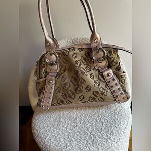 Kathy Van Zeeland purse with crowns and studs